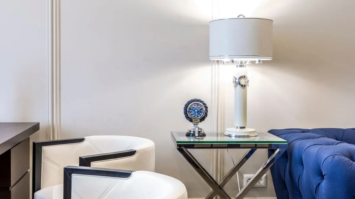 An arc floor lamp positioned near the sofa can do the job of a side table lamp without needing extra furniture