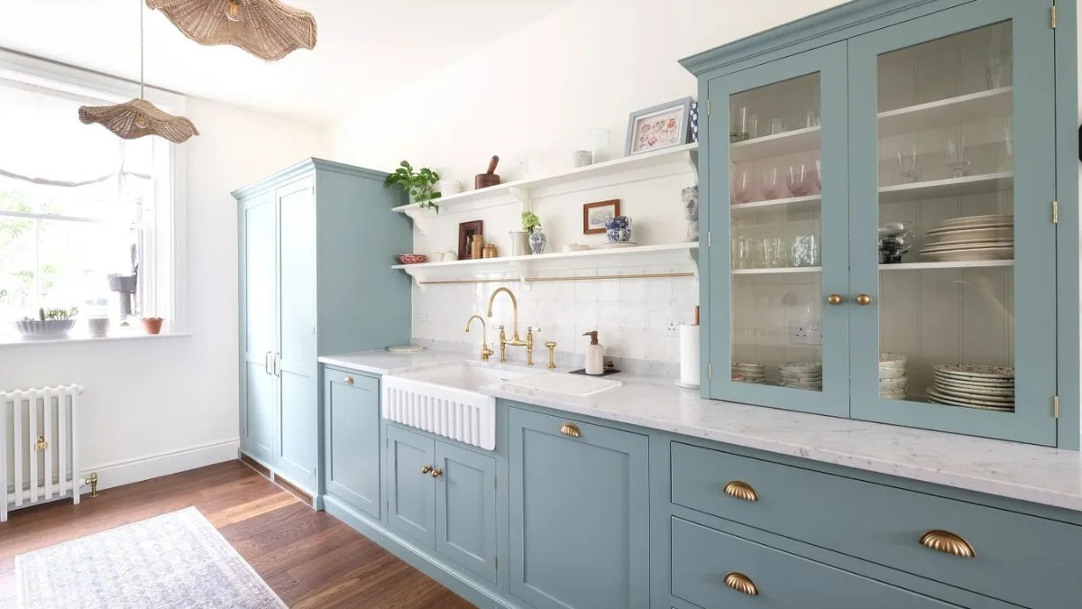 Two-tone cabinets add depth and contrast while maintaining brightness